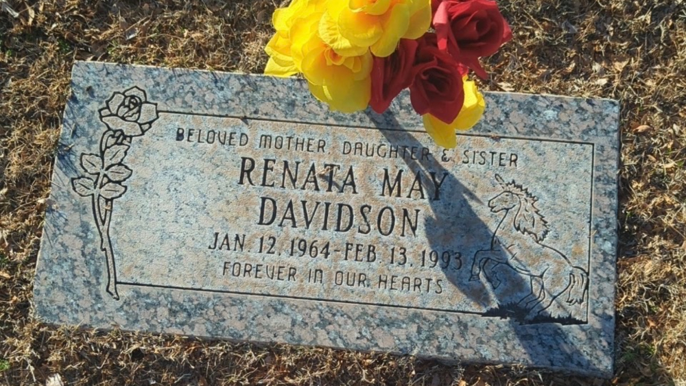 a grave marker that says "beloved mother, daughter and sister, renata may davidson, jan. 12 1964 - feb. 13, 1993, forever in our hearts