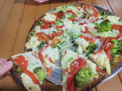 This tucked-away takeout spot gets creative with pizza