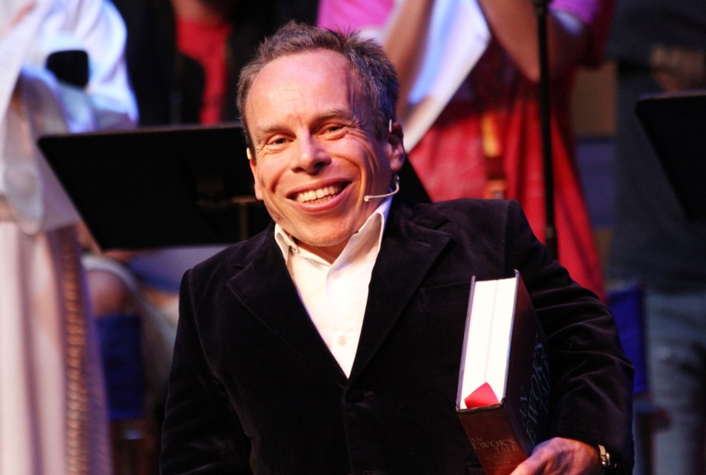 Warwick Davis smiles during an appearance at Star Wars Weekends in Florida in June 2013.