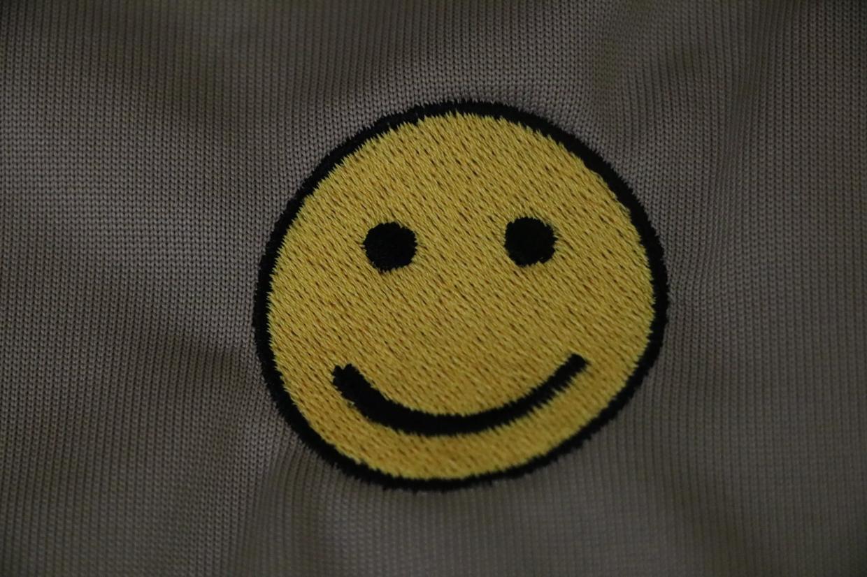 No More Smiley Faces: Arizona DES to Cover Emblem on Shirts Ordered by Fired Director Tim Jeffries