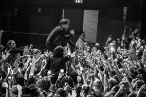 Davey Havok of AFI crowd surfs above fans during a 2017 concert at Marquee Theatre in Tempe.