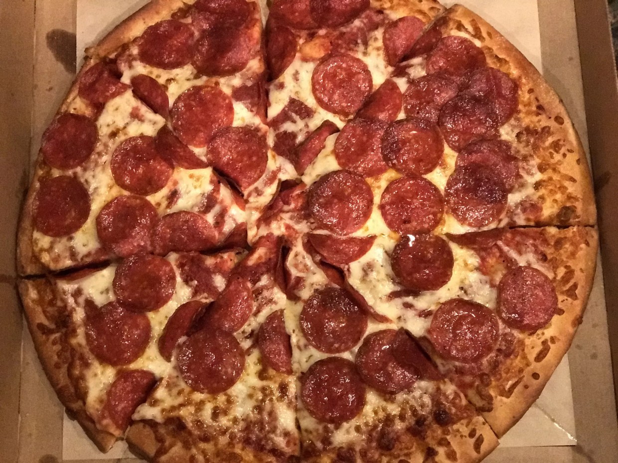 The New ExtraMostBestest Pizza at Little Caesars is the Size of a Small Sedan and Costs Less than a Latte