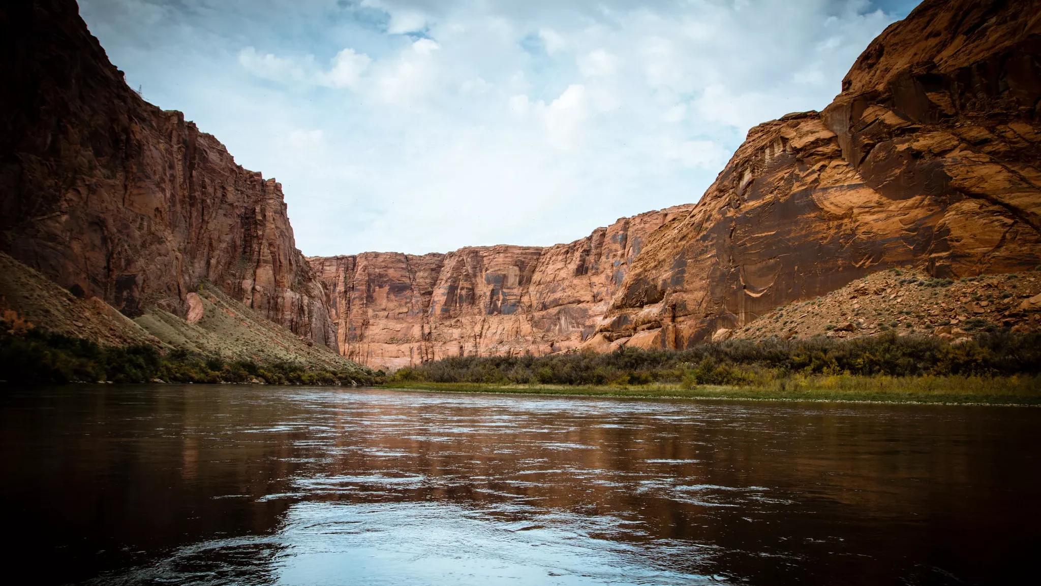 a river runs through a desert landscape