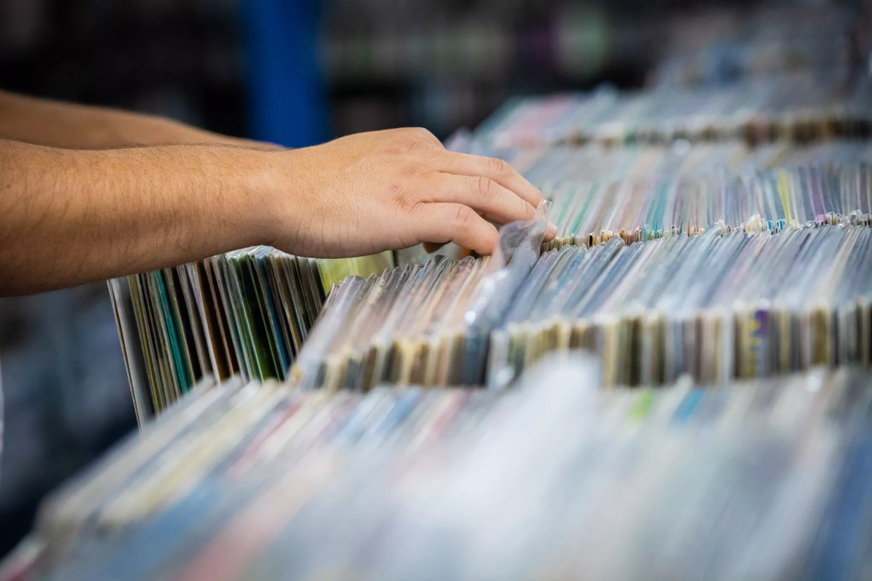A person flipping through records.