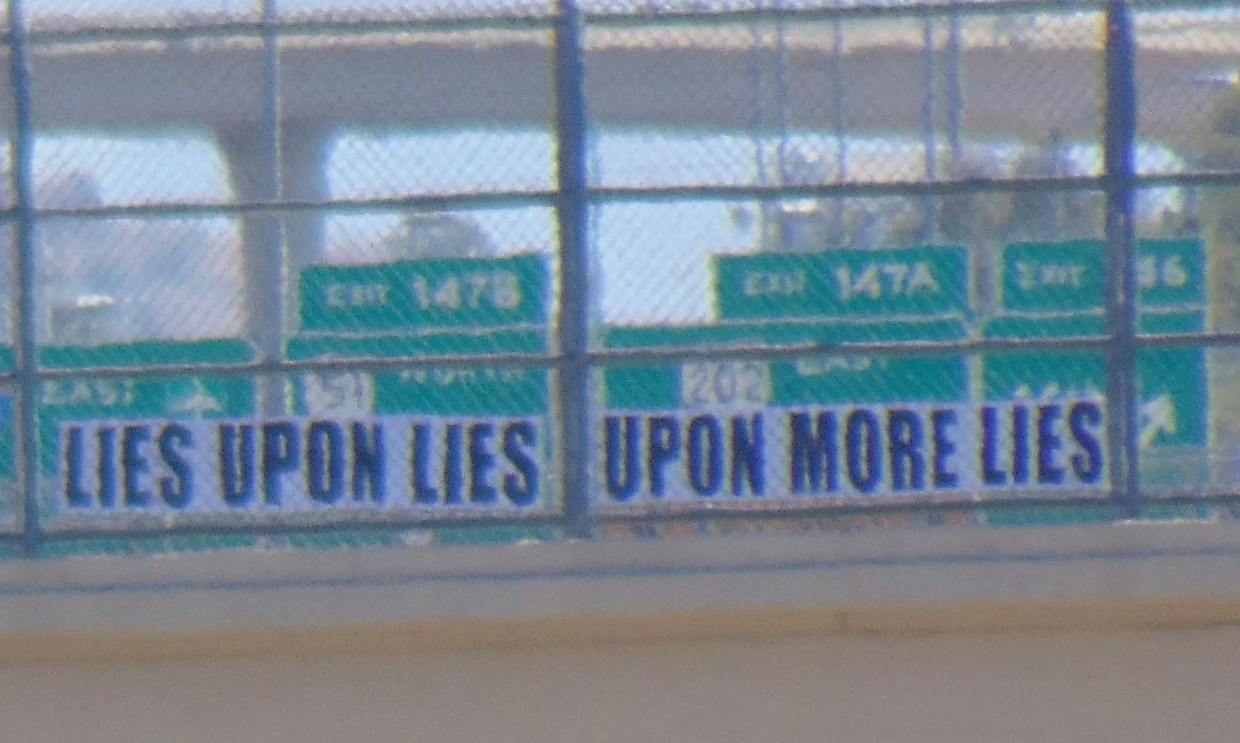 The Man Who Hangs His Political Disdain High Above Phoenix Freeways