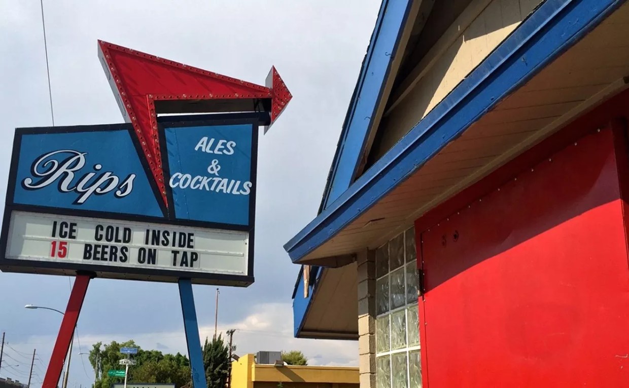 The exterior of a dive bar.