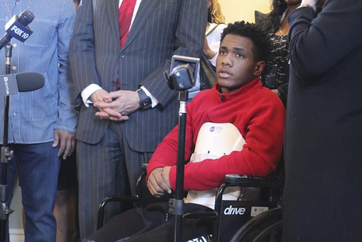 Devin Thompson in a wheel chair