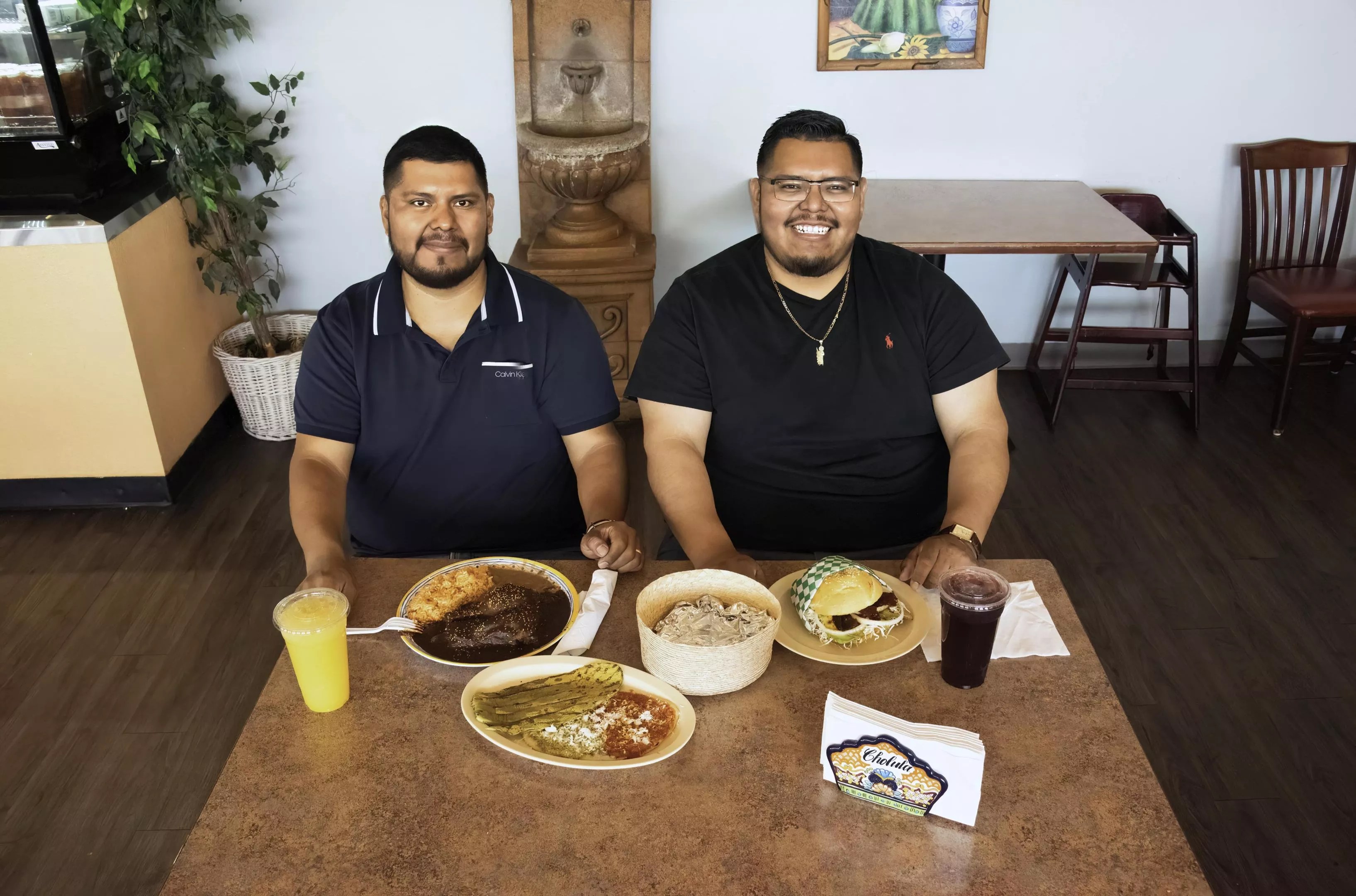 Two men at a table.