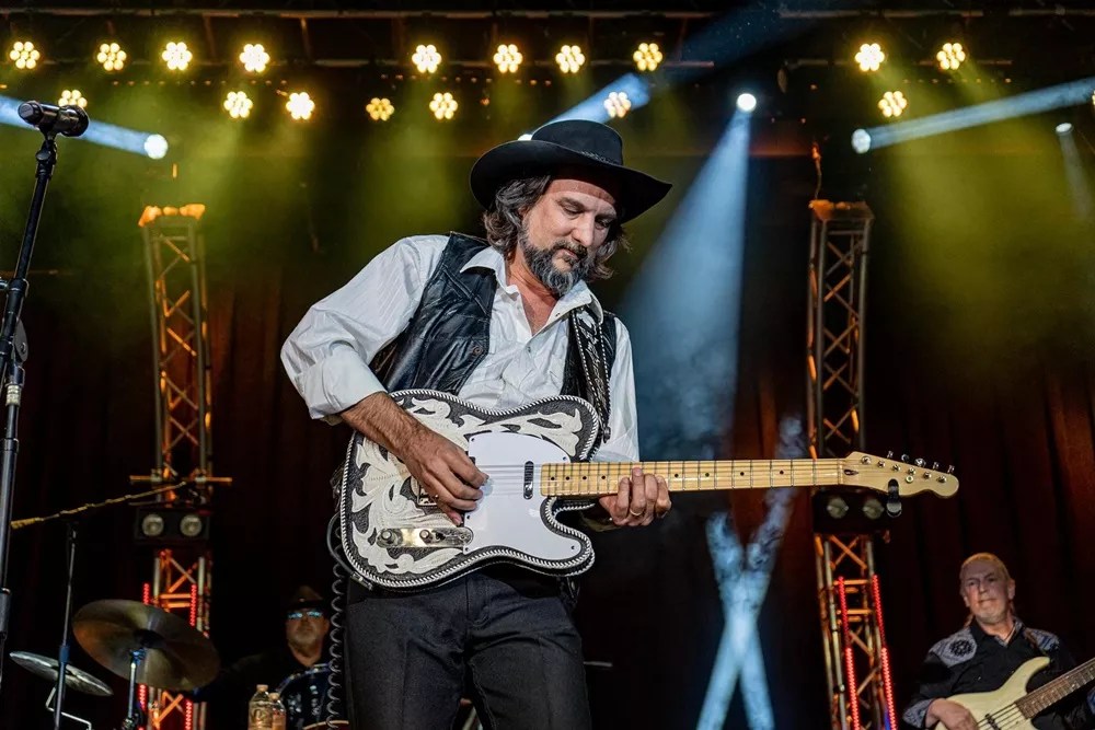 A country singer performing.