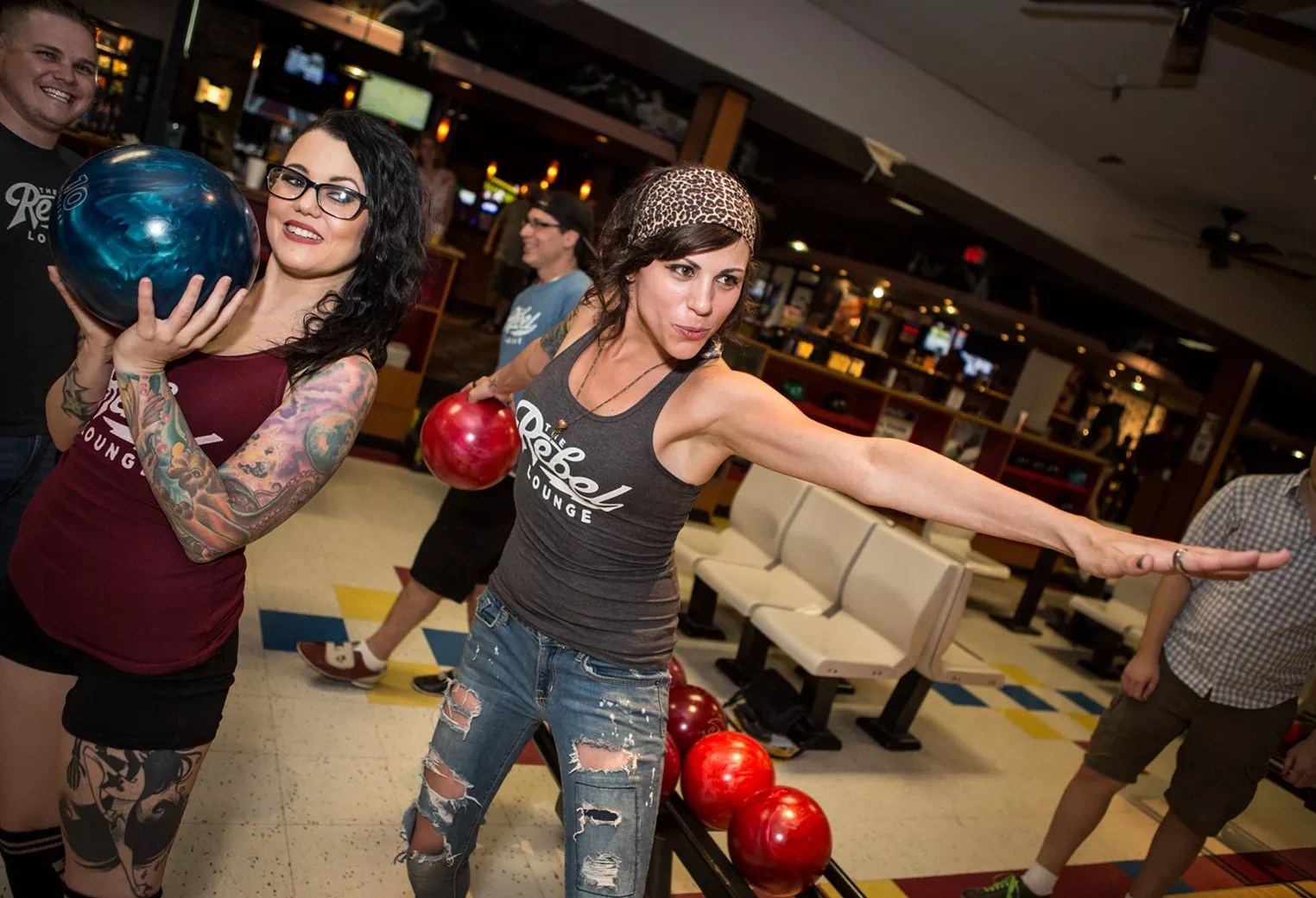 Women bowling.