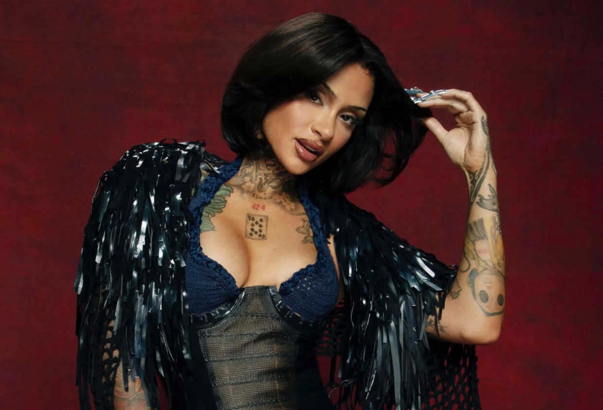 A young woman in a formal dress.