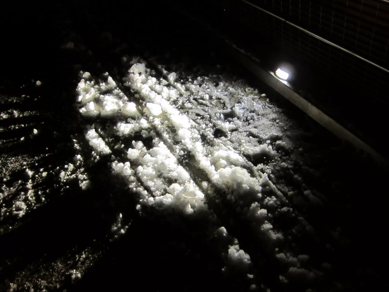 Cocaine on a flat surface.