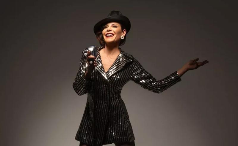 A woman in a stage costume.