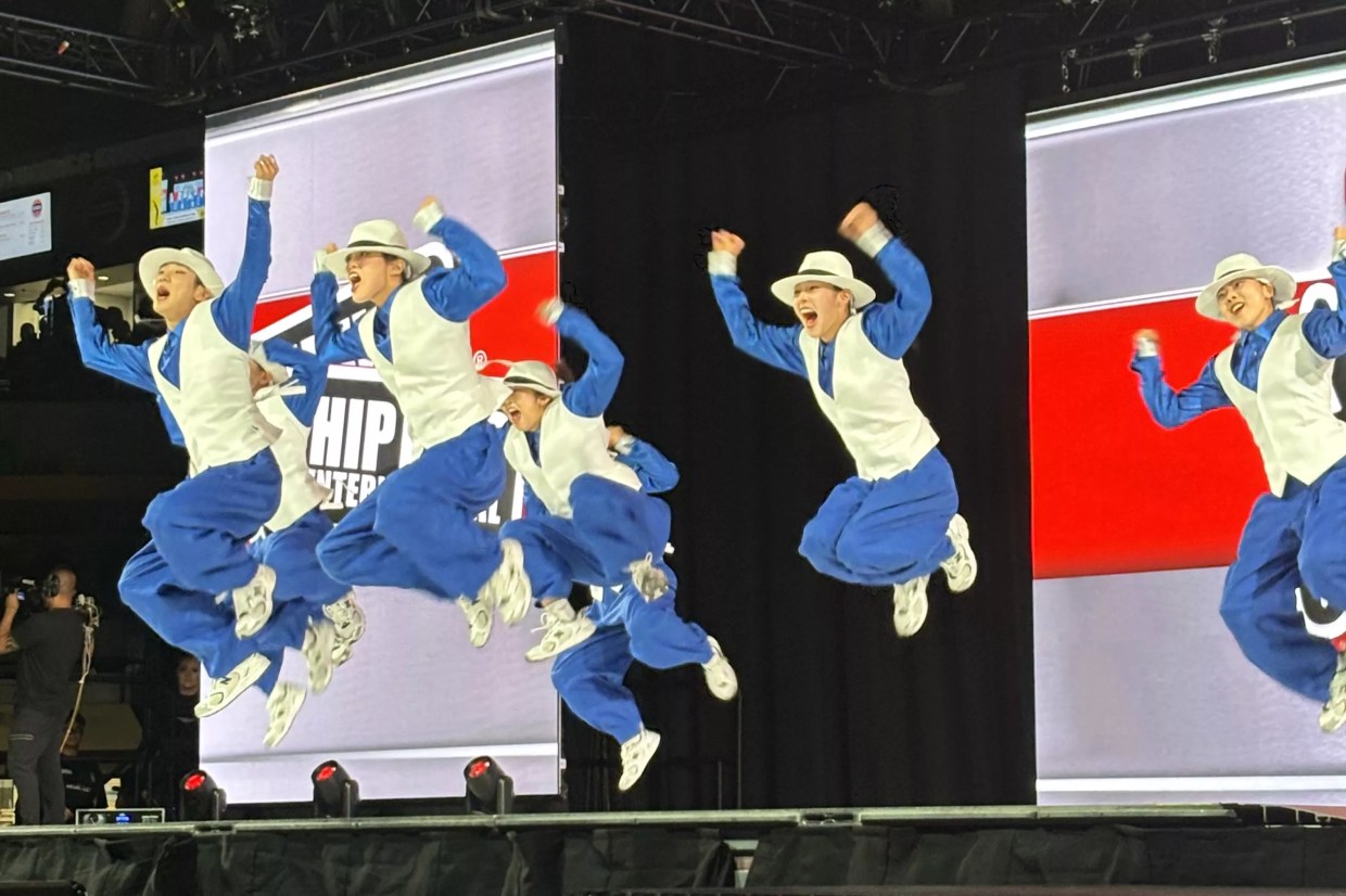 A dance team competing.