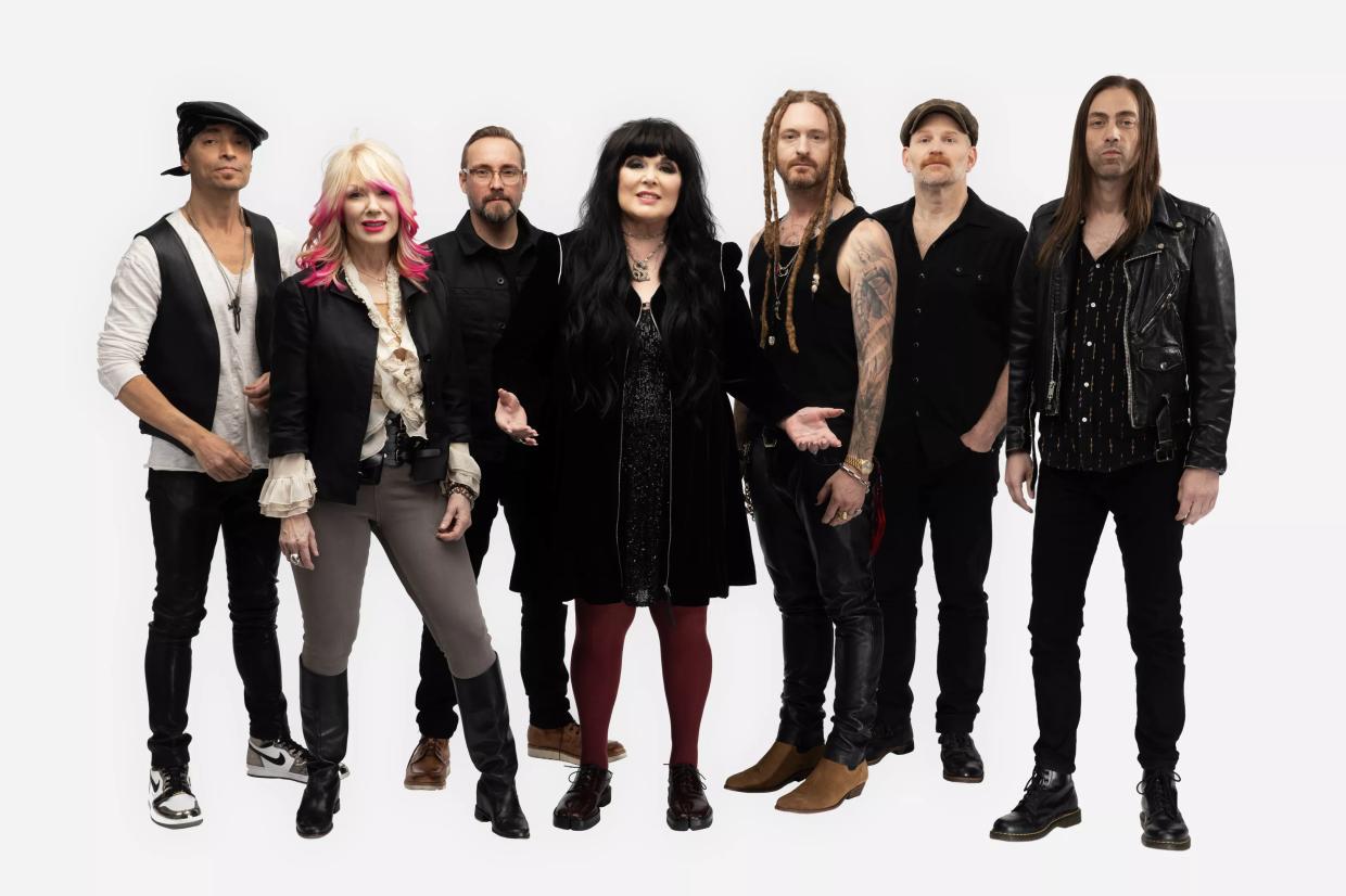 A rock band made up of older men and women.