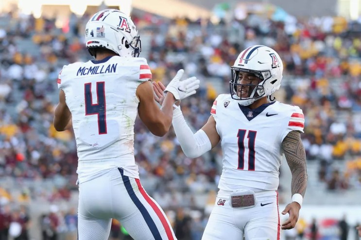 Tetairoa McMillan celebrates with Noah Fifita