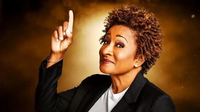 A Black woman pointing up.