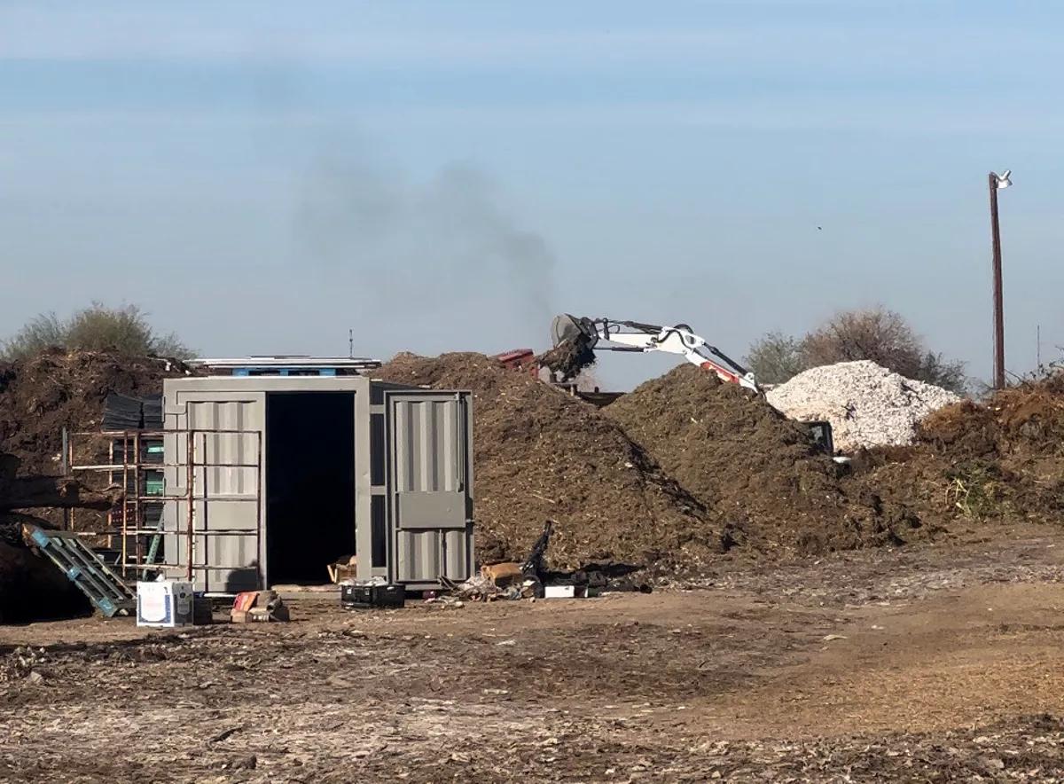 excavators and mounds of dirt
