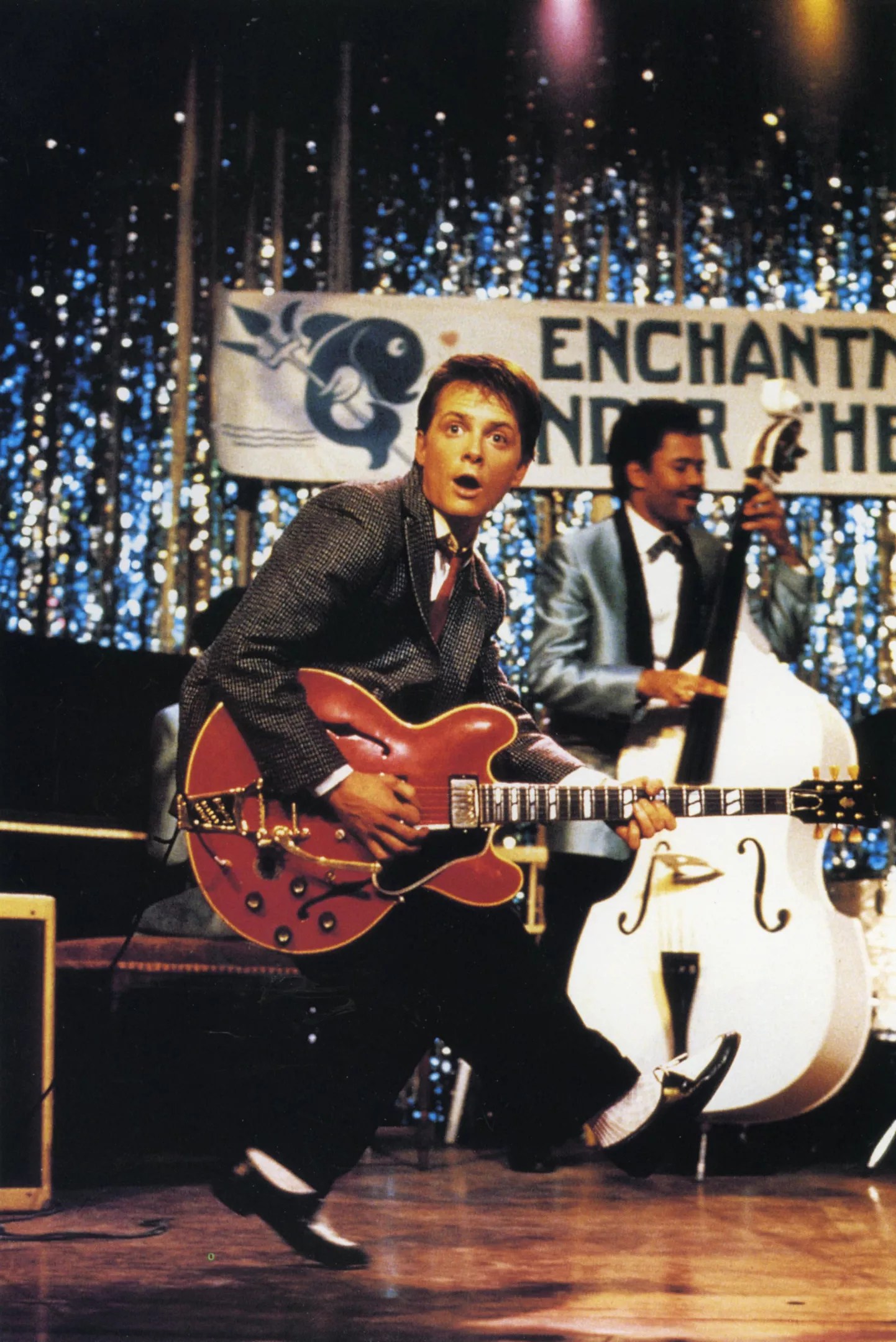 Actor plays guitar in movie