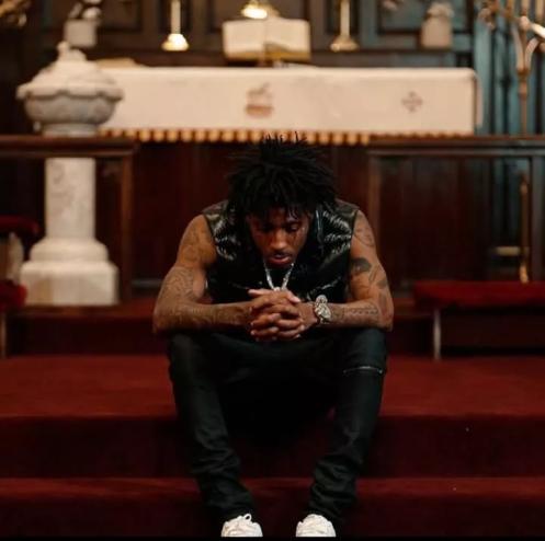 Man sits on stage steps