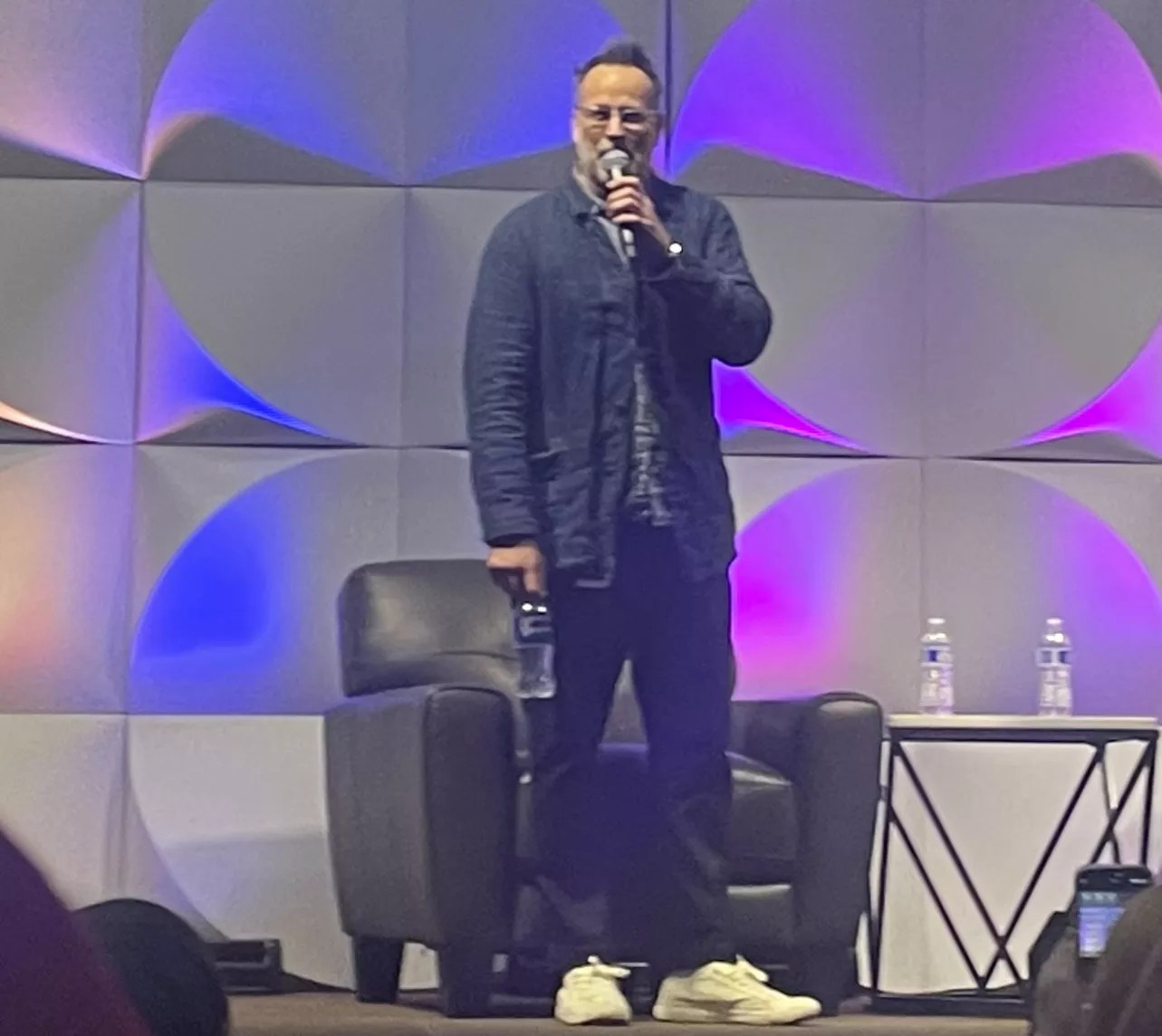 man stands on stage