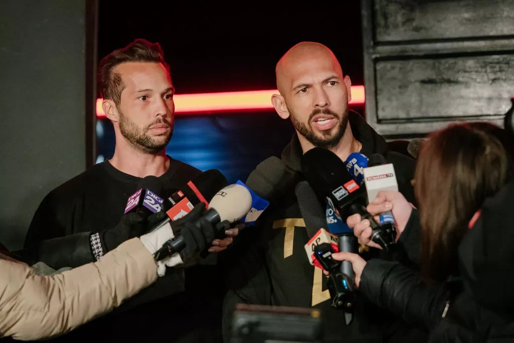 tristan and andrew tate at a press conference