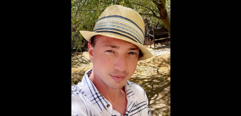 a man in a fedora
