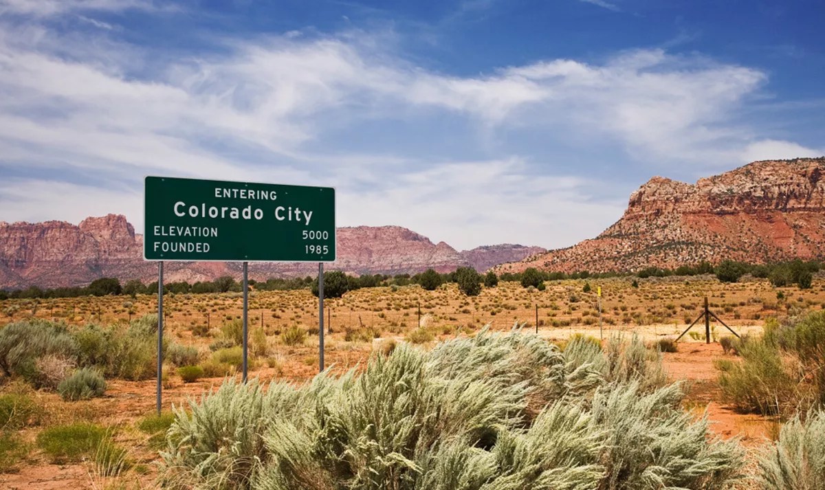 a highway sign for colorado city